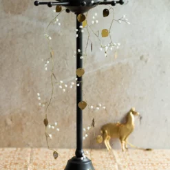 Guirlande baies blanches et or